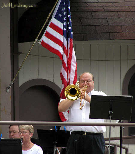 A trumpeter for the Appleton City Band in a performance at Pierce Park, Aug. 9, 2005.