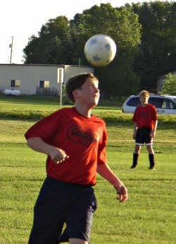 Mark Lindsay using his head in a soccer game, July 2004.