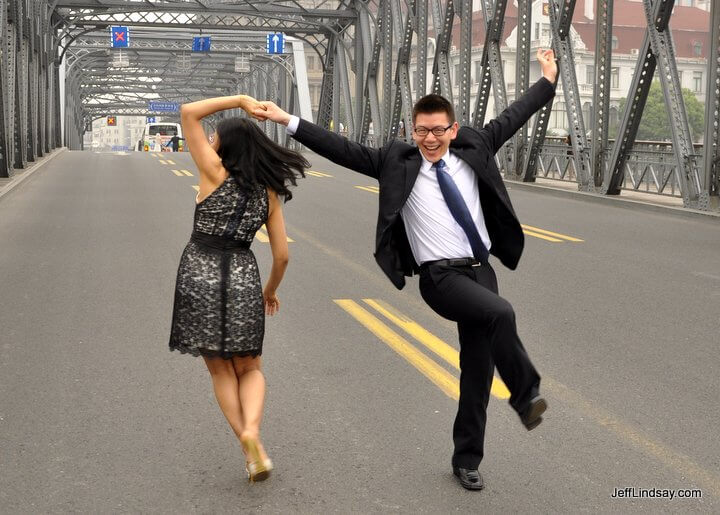 During a momentarily lull in traffic, James and Joyce dance wildly on the bridge, celebrating their joyous wedding. Fortunately, the were able to get out of the way before the next taxi came roaring by. 