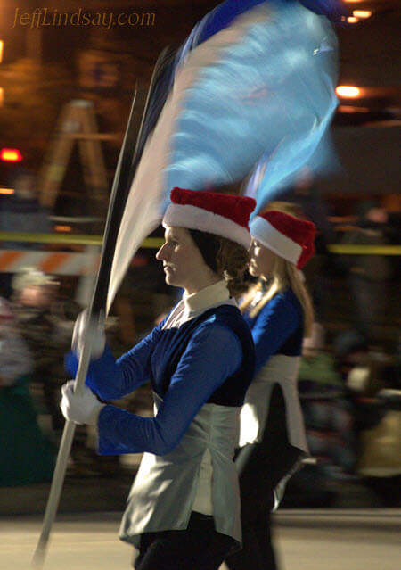 Flag carrier in a marching band at the Christmas Parade, Nov. 23, 2010.