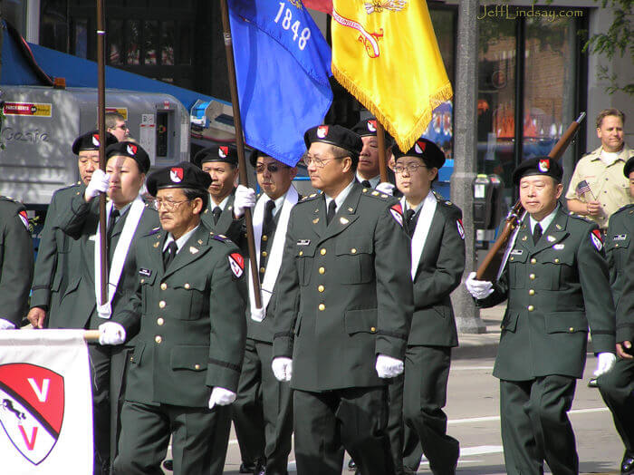 Hmong veterans marching in the Appleton Flag Day Parade, 2007