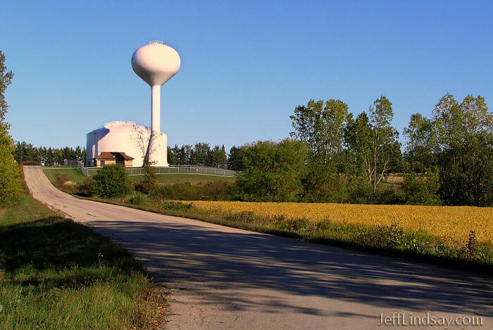 Water towers mark the landscape near Wisconsin towns. Here is one along a country road.