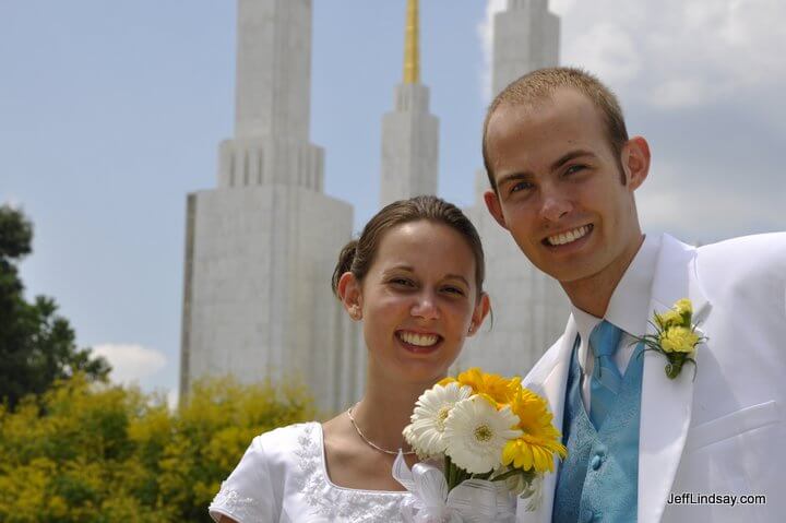 The newlywed couple in front of the LDS Temple.