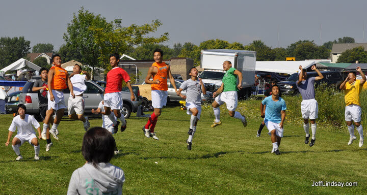 Hmong soccer players flying.