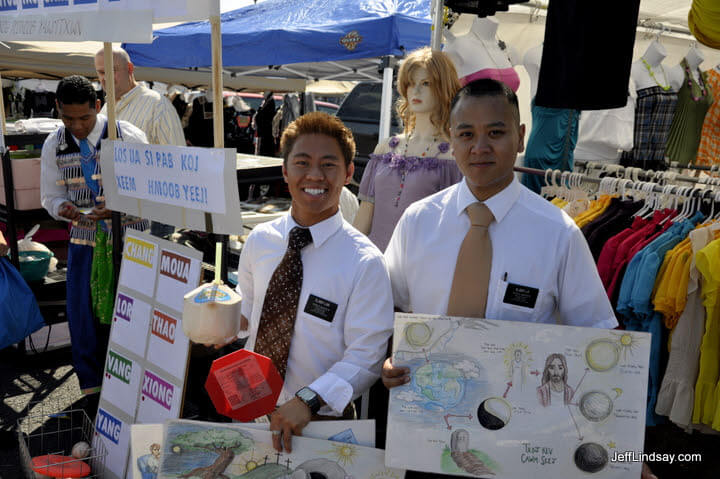 Some Hmong-speaking Mormon missionaries (Latter-day Saiints) at a booth at the Hmong soccer tournament in Oshkosh, 2009.