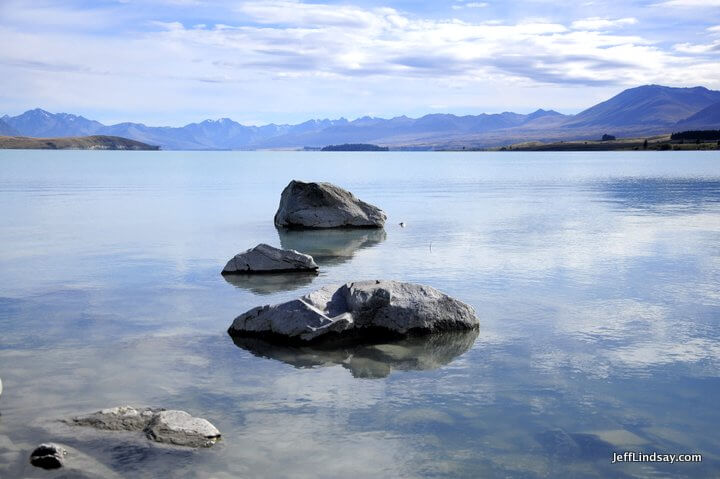 New Zealand: three rocks in a lake