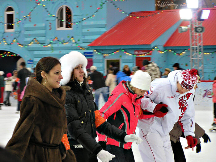 Ice skaters in Moscow at the skating rink on Red Square