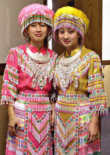 Two beautiful Hmong sisters from Menasha, Wisconsin in elaborate Hmong clothing shortly before performing a beautiful dance in Appleton at the Church of Jesus Christ of Latter-day Saints, Sept. 24, 2004.