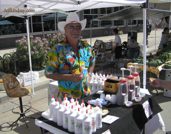 A booth for Jimmy J's Bareback Barbecue Sauce at the farmers' market, Aug. 6, 2005.