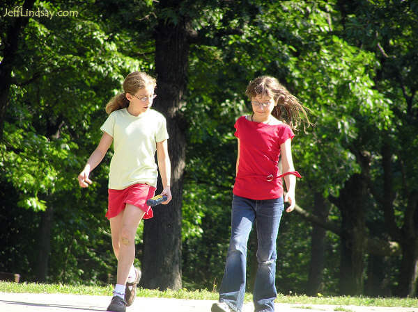 Two friends walking together at High Cliff State Park near Appleton, Wisconsin, Aug. 2005.