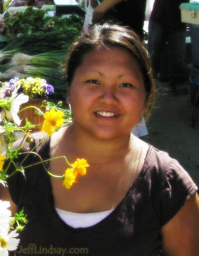 Tria, a Hmong girl at a farmers' market in Appleton, Aug. 2005.