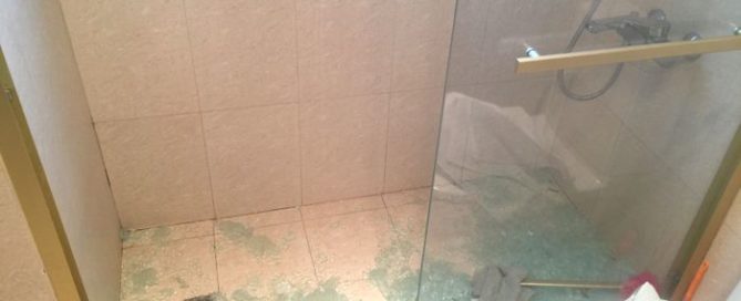 shattered glass from a shower door