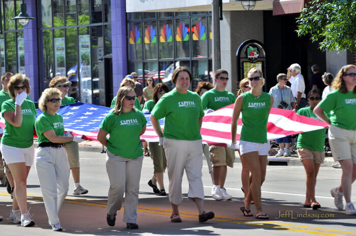 Team of people carrying the flag at the Appleton Flag Day Parade, May 2009.