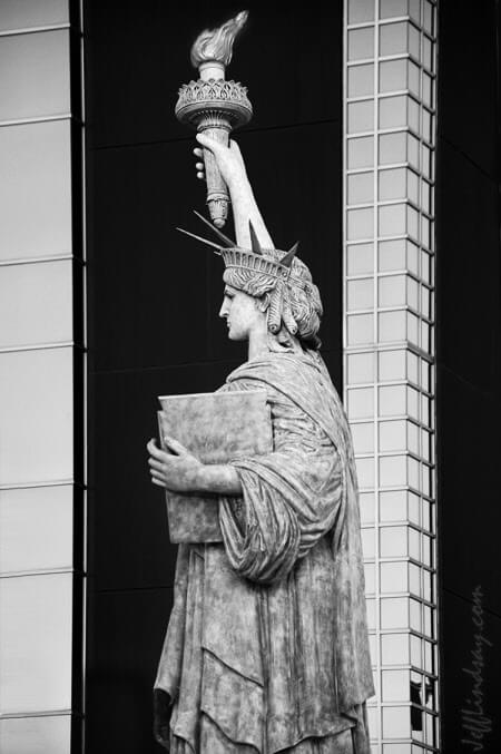 Neenah's Statue of Liberty with a Bergstrom building as a background, 2010.