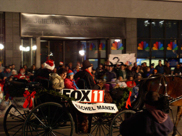 The people from Fox11 TV pose in front of the NBC office - are they trying to say something?.