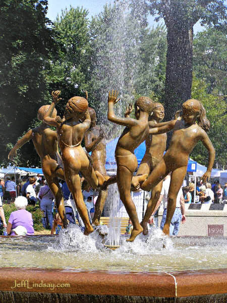 A view of the famous Ring Dance sculpture and fountain in Appleton's lovely City Park, photographed during an Art in the Park event in July 2005.