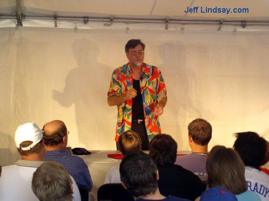 Doc Eason, master of close-up magic, performs in a booth on College Avenue.