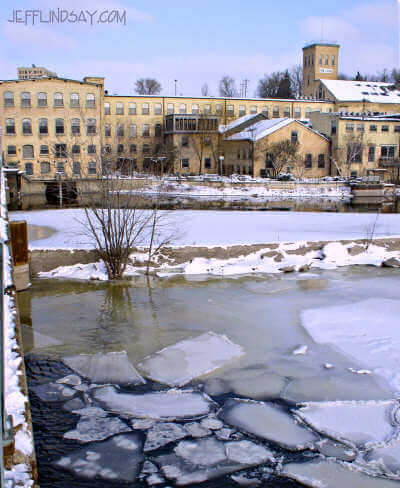 Historic buildings along the Fox River in the Oneida Flats region.