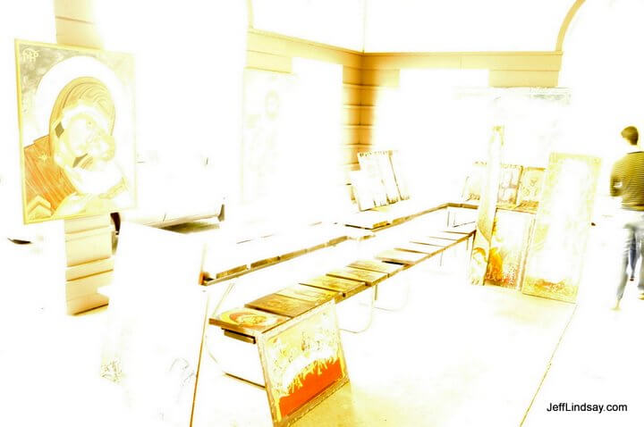 Greek Orthodox activity at Pierce Park, Neenah, 2009. Overexposed view of some icons and artwork inside a pavillion.