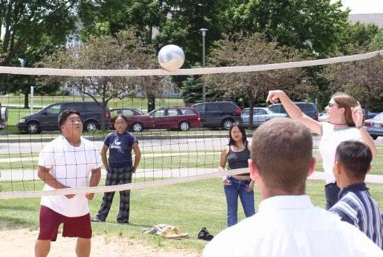 Many Hmong youth in Appleton are outstanding volleyball players (here my friend Lee Pao Vang is playing in a park in nearby Oshkosh).