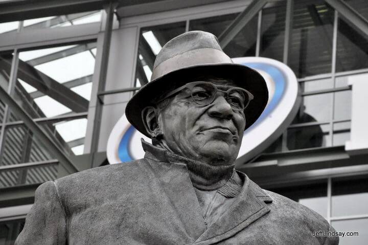 Saint Vincent of Lombardi, one of football's pattron saints, is honored with this statue in front of Lambeau Field. The halo is courtesy of Miller Beer and their oval sign on the stadium itself.