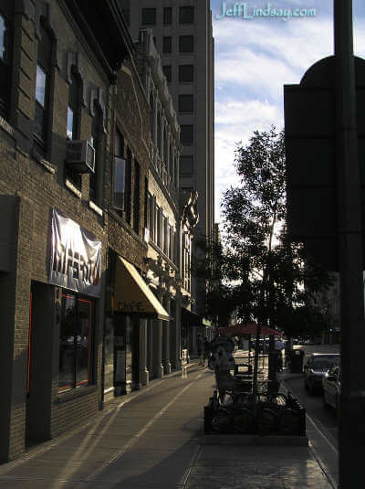 A sidewalk scene along College Avenue at dusk, Aug. 23, 2005.