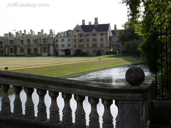 A view of a bridge behind some colleges on the Cam River.