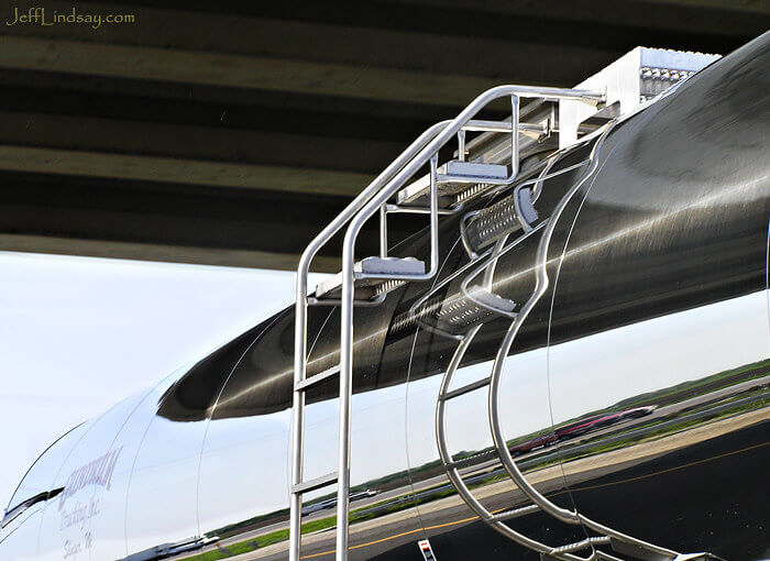 Ladder on the side of a liquid transport truck while driving on Highway 41/45 near Slinger, Wisconsin, on our way to Chicago. My wife took the photo as I got the car into position for the shot I wanted. We passed under a bridge at that moment.