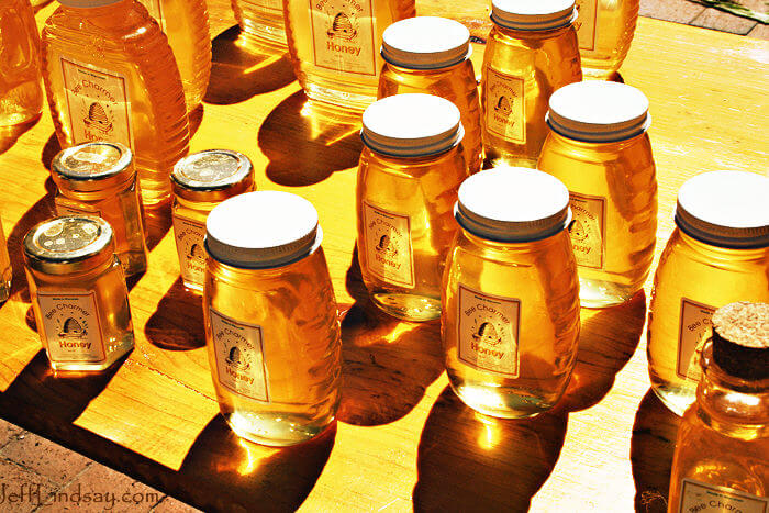 Local honey on sale at the huge farmers market in Madison, Wisconsin, Aug. 2008. I bought some and it was exceptionally good!