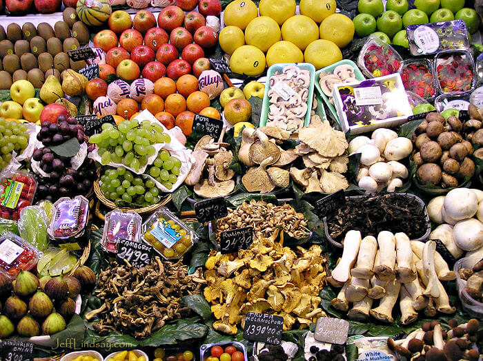 Mushrooms and fruit on display in Barcelona's central market, March 2008. 