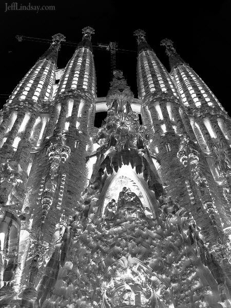 Inverse black and white image of Gaudi'a great cathedral.