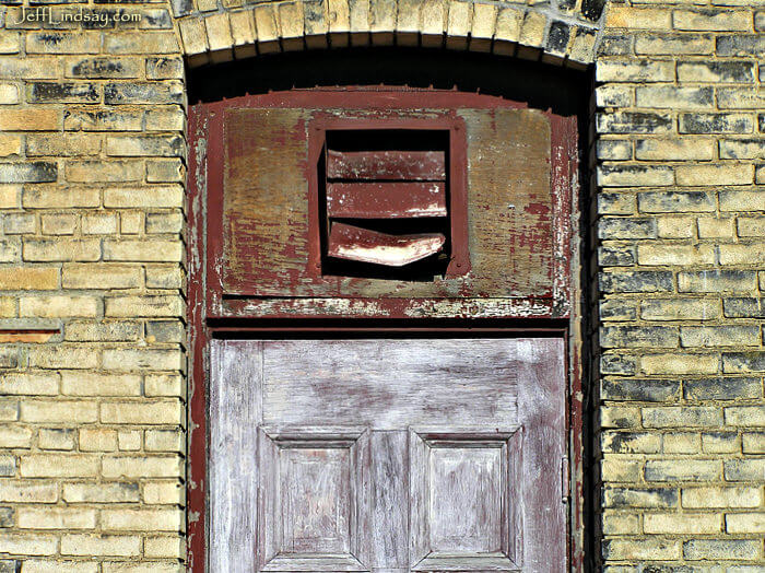 A door in downtown Appleton on the back side of a College Avenue shop.