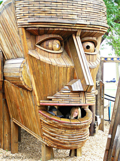 A strange wooden head serves as playground equipment in Menominee park, Oshkosh. This is a photo of a relative of mine.