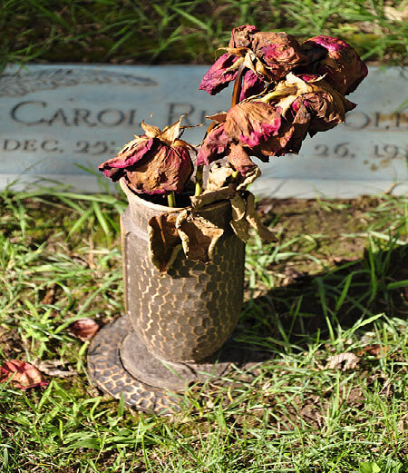 Withered flowers at a tombstone in Appleton, a reminder of the temporary nature of our lives here. Are you focused on what will matter for the long run?