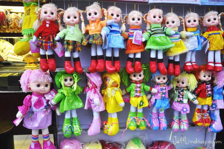 Dolls hanging in a Chinese shop in Shanghai near Yu Gardens, 2011.