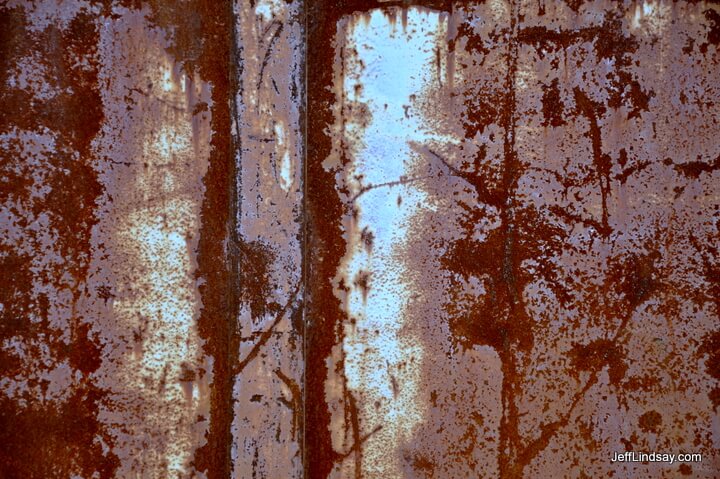 Rust on waste bin, Neenah, Wisconsin, 2010.