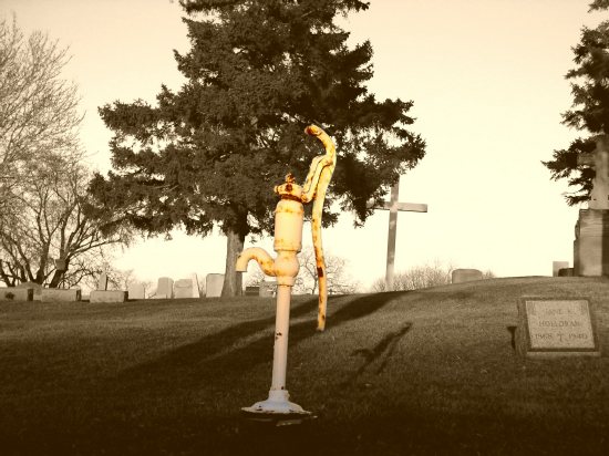 Pump in an old graveyard in Neenah, near Bergstrom's Auto Center.