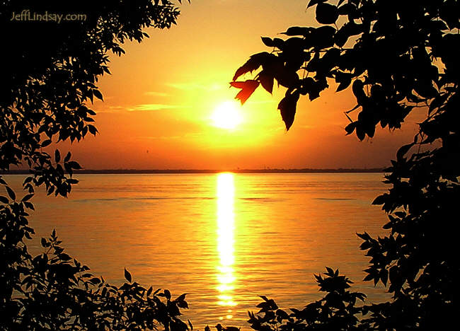 Sunset over Lake Winnebago, viewed from the Lime Kiln Trail in High Cliff State Park, Aug. 4, 2006.