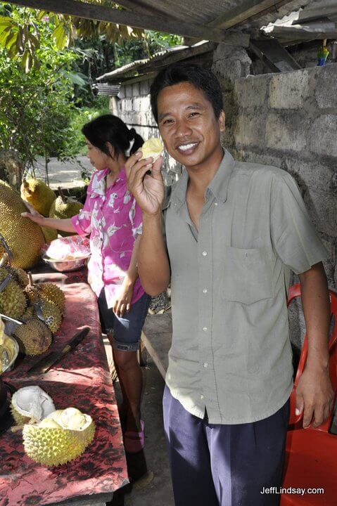 Our driver shows off some durian at a roadside stand in Bali.