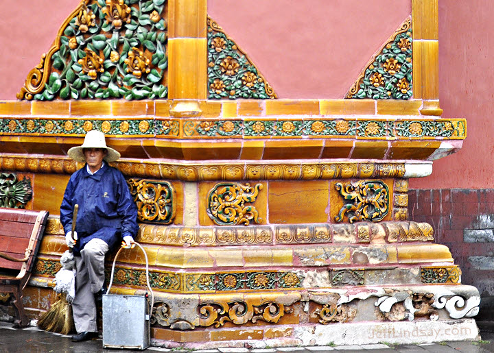 A worker at a wall in the Forbidden City of Beijing, Sept. 2011.