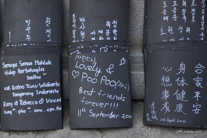 Clay tablets withi names written thereon to be placed in a Buddhis temple. Some of the English names that Asians pick for themselves puzzle me. But good luck to Poo Poo and Lovely!