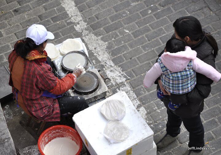 Spinning griddle for wonton wrappers. Shanghai, 2012