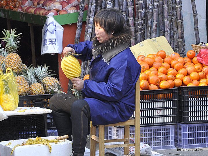 Pineapple carver, Shanghai, 2012