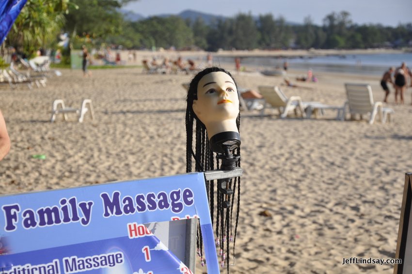 The massage will be great, or heads will roll. Seen on Khlong Dao Beach on the west side of Ko Lanta.