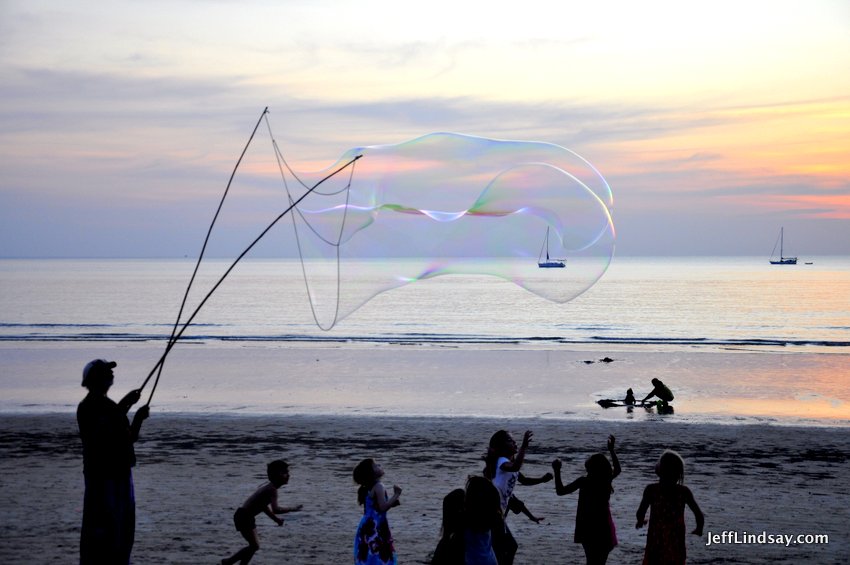 Even distant boats can be enchanted by the spell of the magical bubbles.