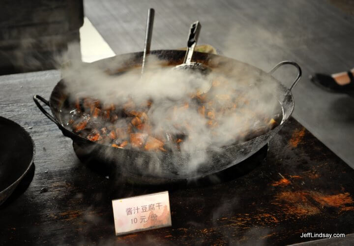 A tofu dish being cooked and sold at Wuzhen.