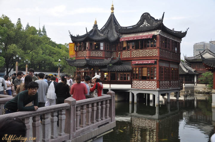 The central tea house at Yu Yuan and the zig-zag bridge that keeps away evil spirits. Appears to be working well.