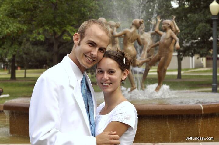 In front of the famous fountain in City Park, Appleton.