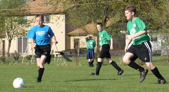 Mark playing soccer