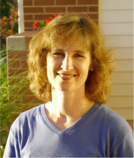 Kendra in front of her parents' home in Utah, Aug. 2004.